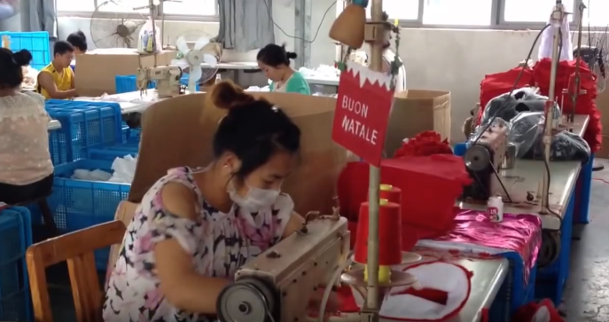 Christmas hats are made in a factory near Yiwu. By Tim Maughan, 2014