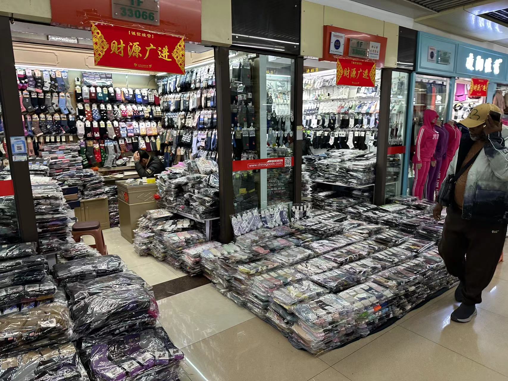 shops_in_yiwu_socks_market_with_inventory_stock
