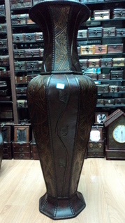 wood and artificial leather vase