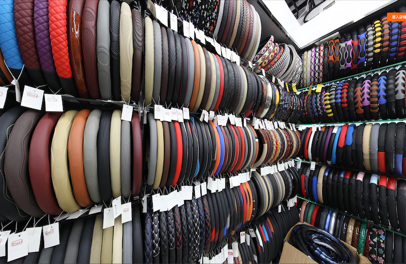 A car steering wheel cover booth in Yiwu market.